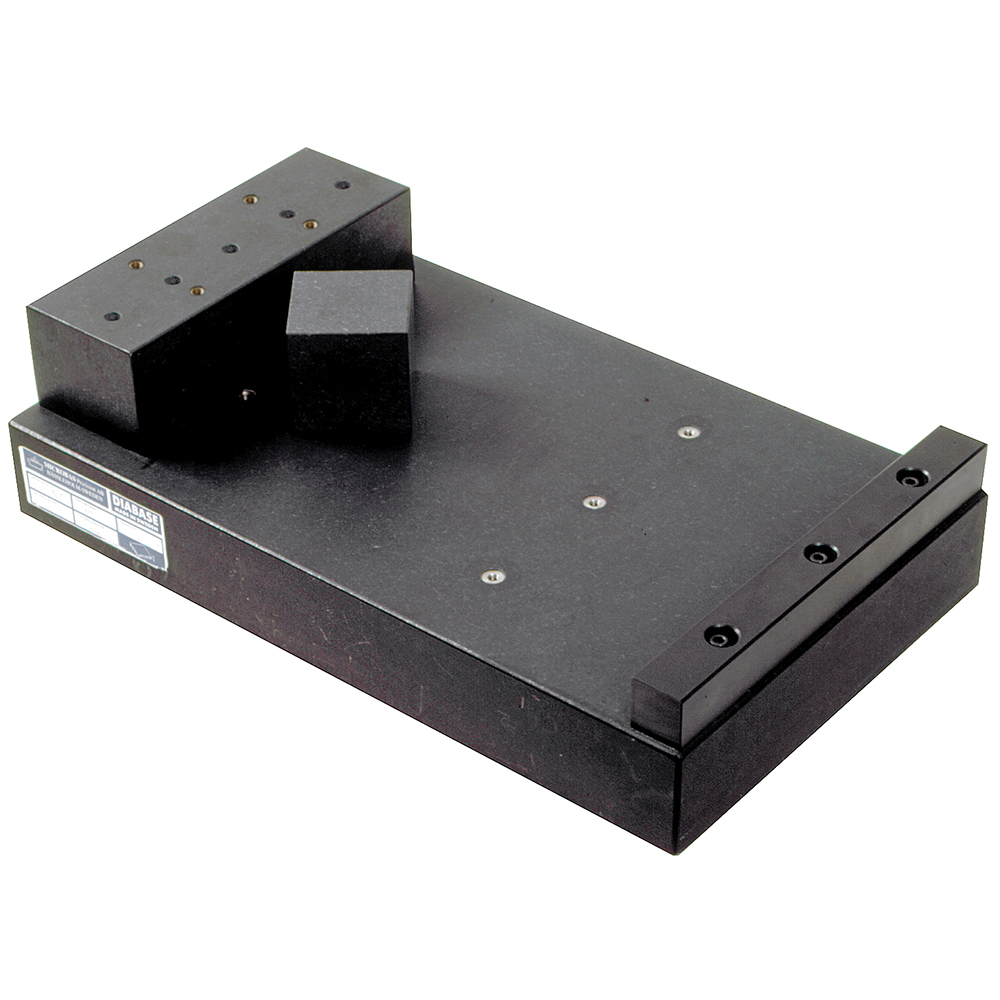 Surface plate with reference stops, a mounting stone with bushings and holes for mounting a chuck/reference element and through holes for mounting on the surface plate, and a check stone. A dial indicator is required.